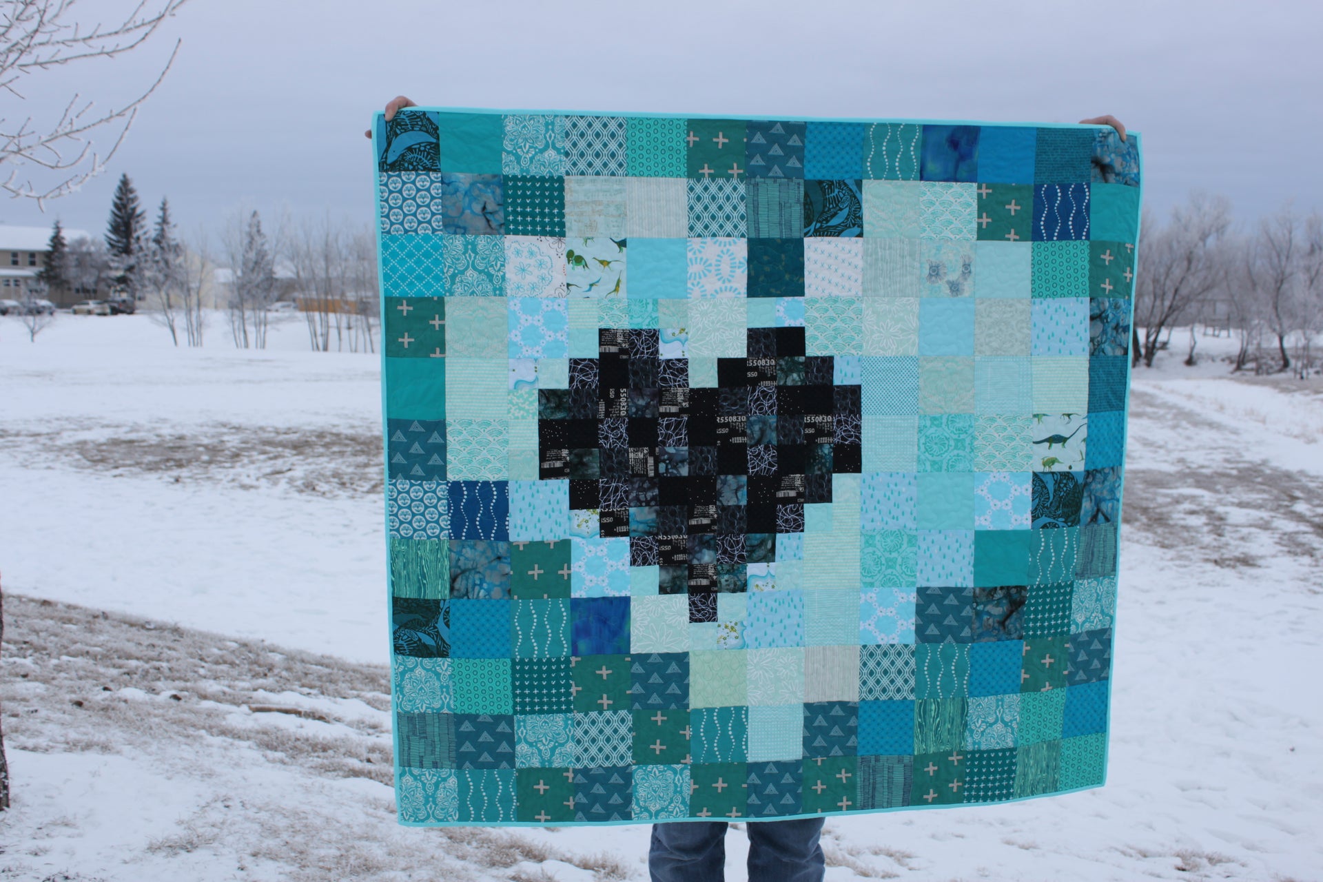 Load video: Some red squares that became part of a Pixel Heart in a Pixel Heart Quilt.